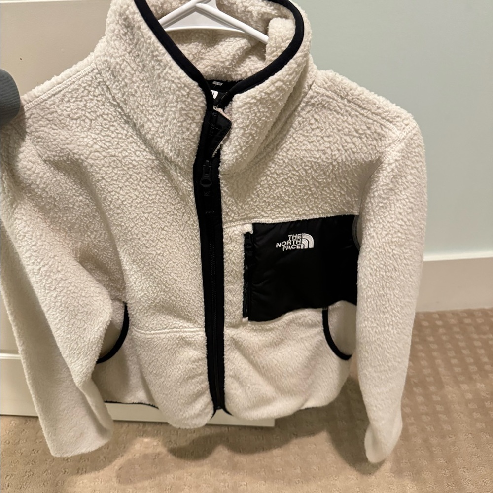 The North Face jacket* offers welcome